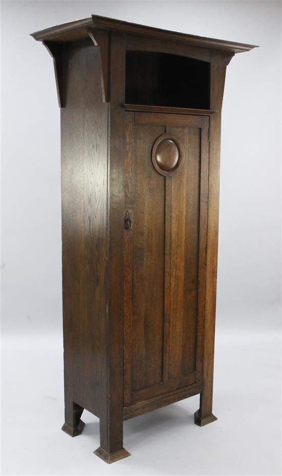 An Arts & Crafts oak hall cupboard, W.3ft 3in.